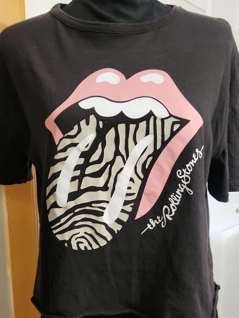 the Rolling Stones Black Tee with Pink Lips and Zebra Lick Graphic